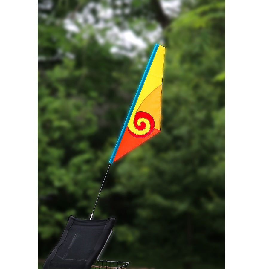 SoundWinds Spiral Recumbent Bike Flag displayed in a bright yellow color attached to a bicycle, featuring a durable pole designed for outdoor cycling.