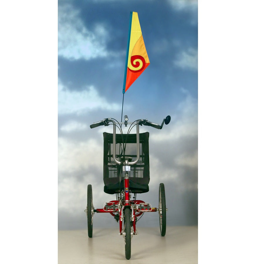 SoundWinds Spiral Recumbent Bike Flag displayed in a bright yellow color attached to a bicycle, featuring a durable pole designed for outdoor cycling.
