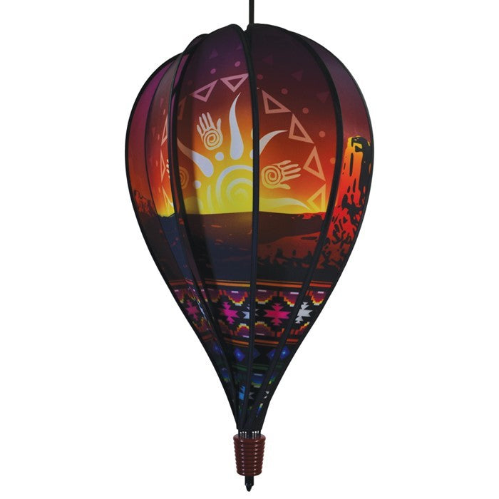 Southwest 10-Panel Hot Air Balloon Spinner in colorful geometric designs, spinning in a garden setting, showcasing vibrant outdoor decor.