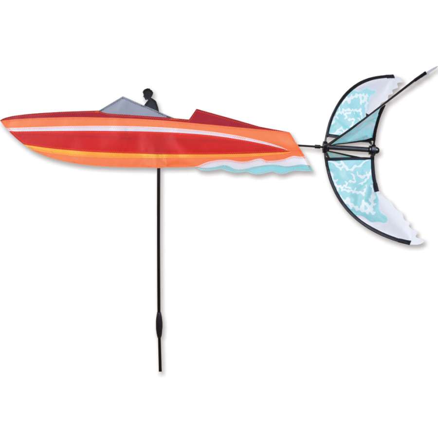 Colorful Speedboat Garden Spinner with dynamic movement in a garden setting, designed to enhance outdoor landscapes and bring joy.