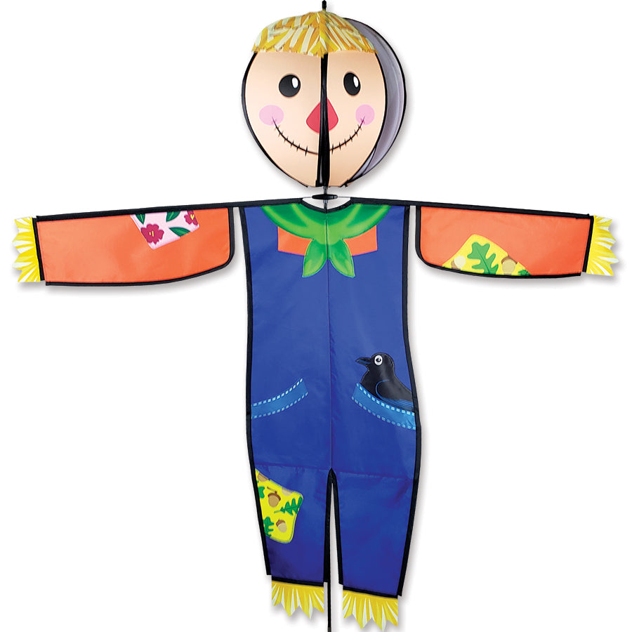 Spinning Friend - Sammie Scarecrow outdoor garden spinner with a colorful design, showing the playful scarecrow spinning in a light breeze.