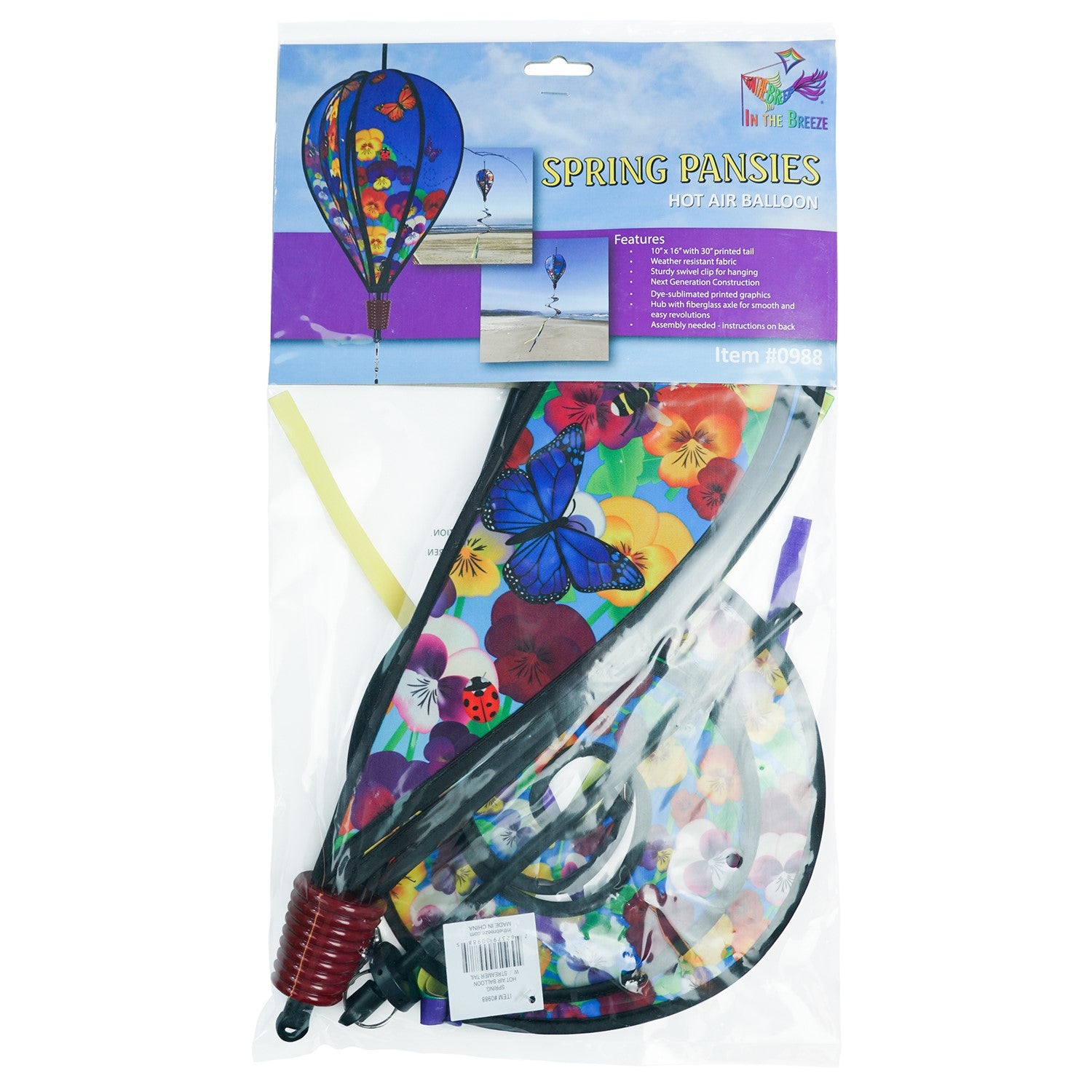 Colorful Spring Pansies 6-Panel Hot Air Balloon spinner in outdoor setting, showcasing bright floral patterns and spinning gracefully.