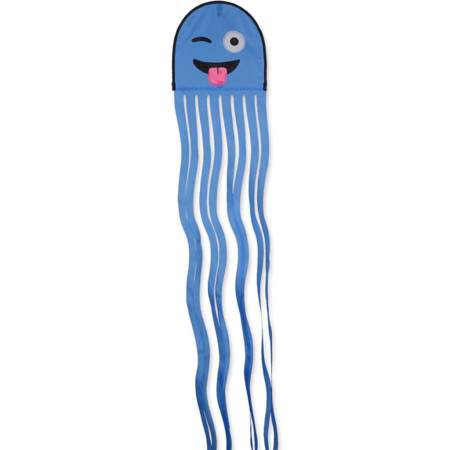 Squeaker Kite featuring a vibrant octopus design and squiggly tails flying against a blue sky, showcasing its playful colors and large eyes.