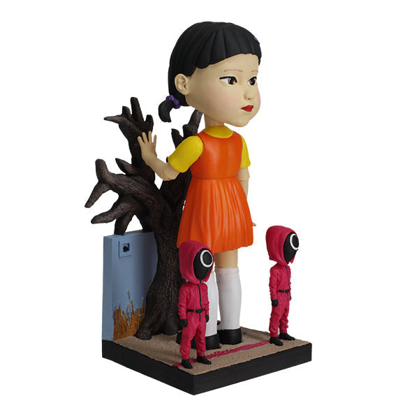 8-inch Squid Games Young-Hee Doll bobblehead displaying intricate details and vibrant colors, nodding on a sturdy base.