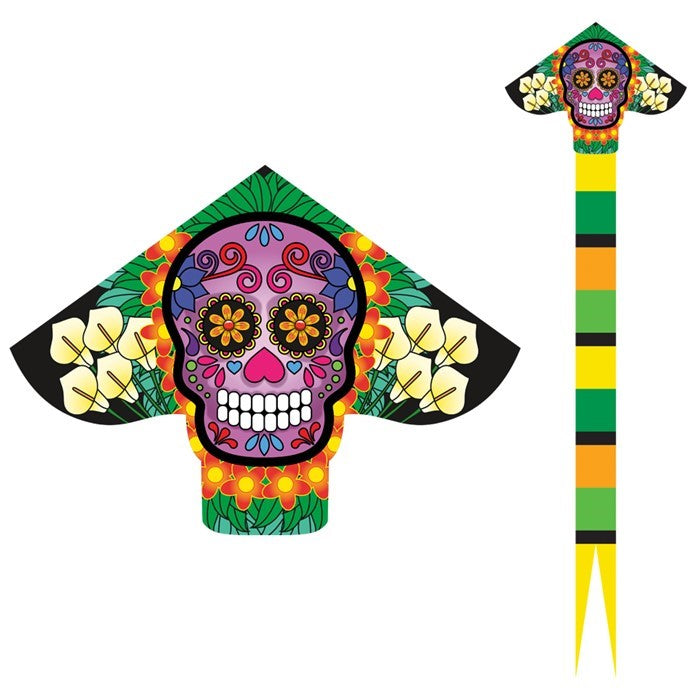 Sugar Skull Delta XLT Kite featuring a colorful Day of the Dead design flying against a clear blue sky, showcasing its large size and vibrant graphics.
