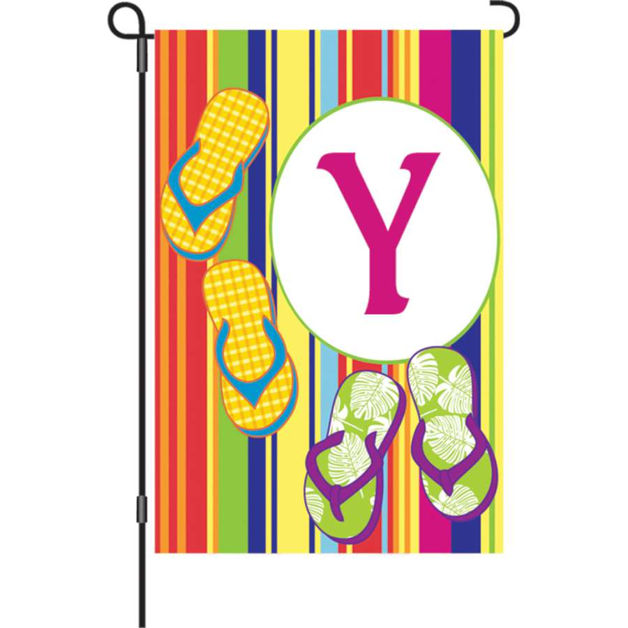 Summer Monogram Flag - Y, measuring 12x18 inches, displayed in a garden setting with vibrant colors and a top-stitched design.