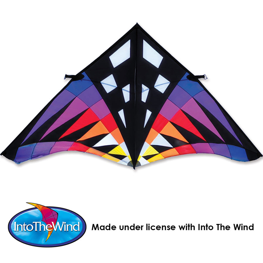 Sweet 16 Delta Kite - Sunset Check, featuring vibrant colors and a large design, soaring high against an open blue sky during outdoor flight.