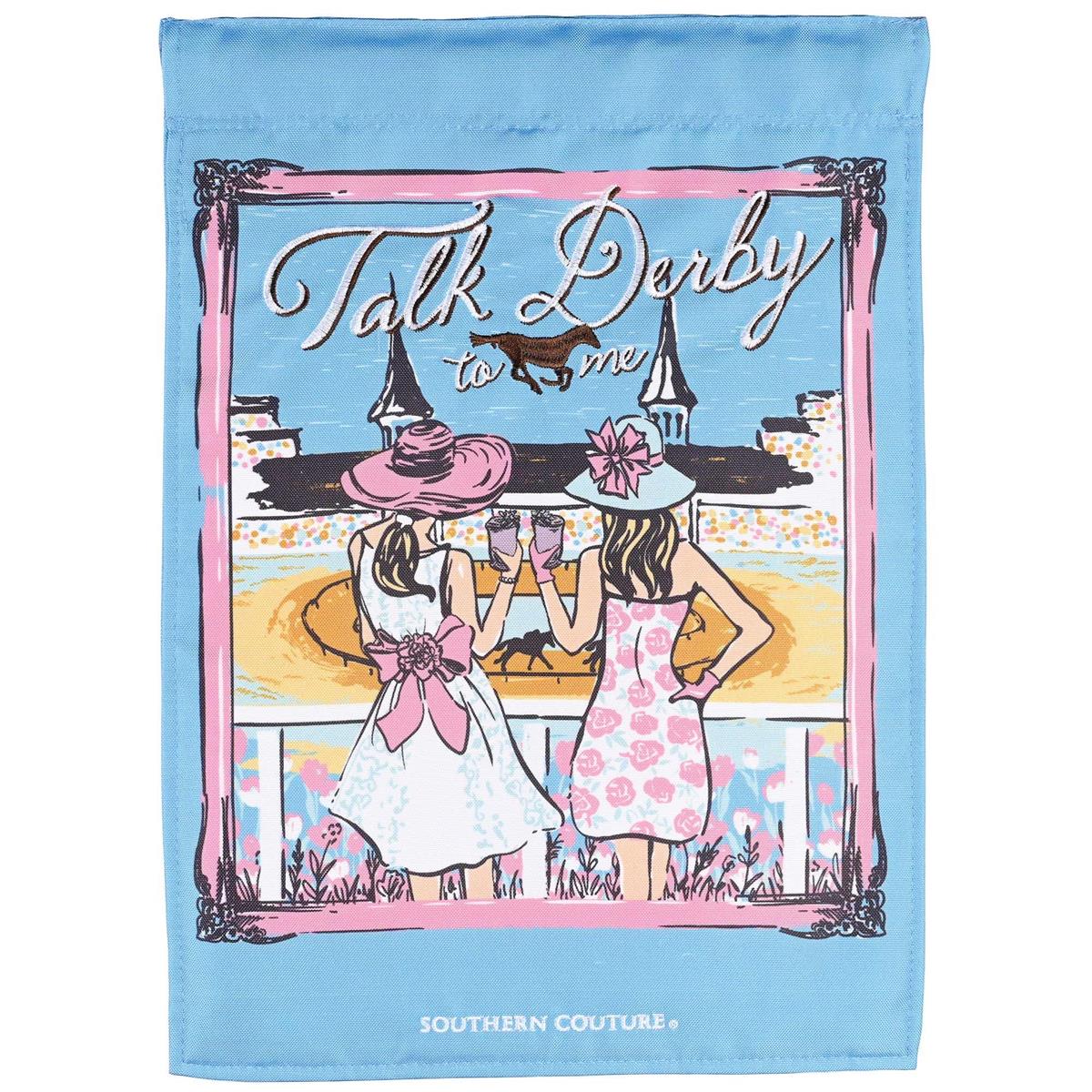 Talk Derby To Me double-sided garden flag featuring playful horse-themed design in vibrant colors displayed in a garden setting.