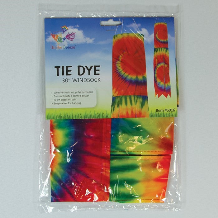 Tie Dye 30\" Windsock featuring a colorful spiral design with six flowing tails, elegantly hanging outdoors in a vibrant setting.