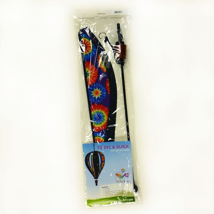 Vibrant Tie Dye 6-Panel Hot Air Balloon garden spinner hanging in a sunny outdoor setting, showcasing colorful tie-dye pattern.