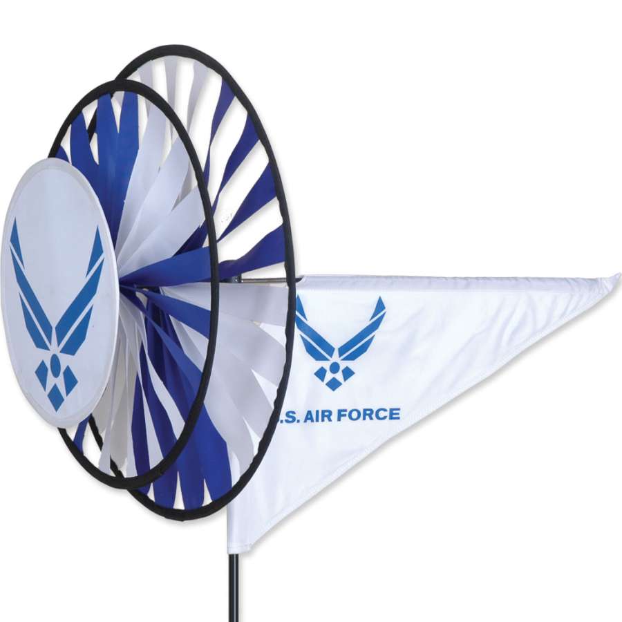 Triple Spinner - Air Force featuring vibrant colors, made from SunTex fabric, spinning gracefully in an outdoor garden setting.
