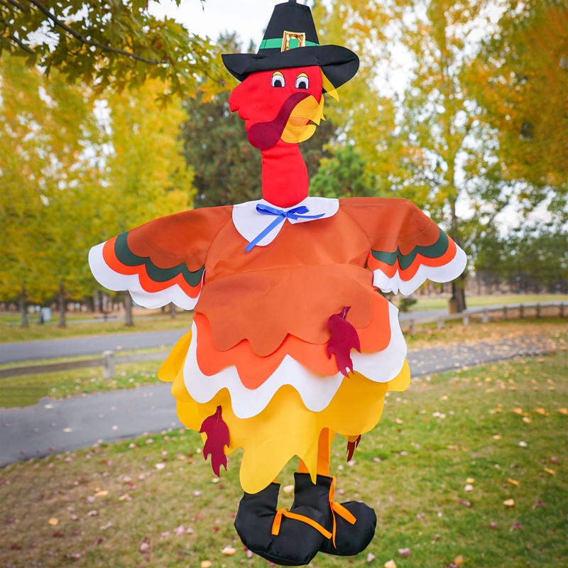 Turkey Wind Friend fluttering outdoors, adding a festive touch to your garden or porch, perfect for Thanksgiving celebrations and autumn decorations.