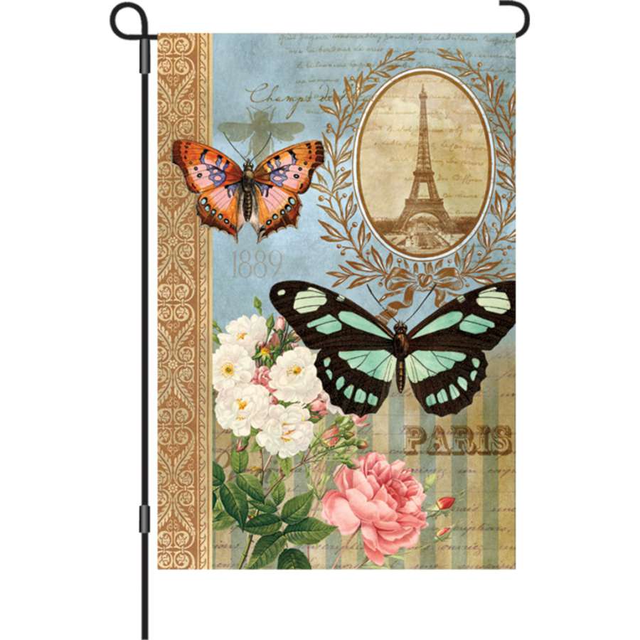 12 in. Unique Butterflies flag made from PremierSoft fabric with colorful butterfly design, displayed in a garden setting.