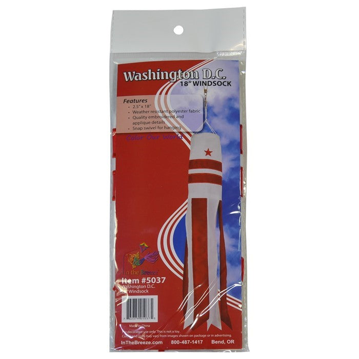 Washington DC 18-inch windsock featuring the DC flag design, with color-coordinated tails fluttering outdoors in a breezy garden setting.