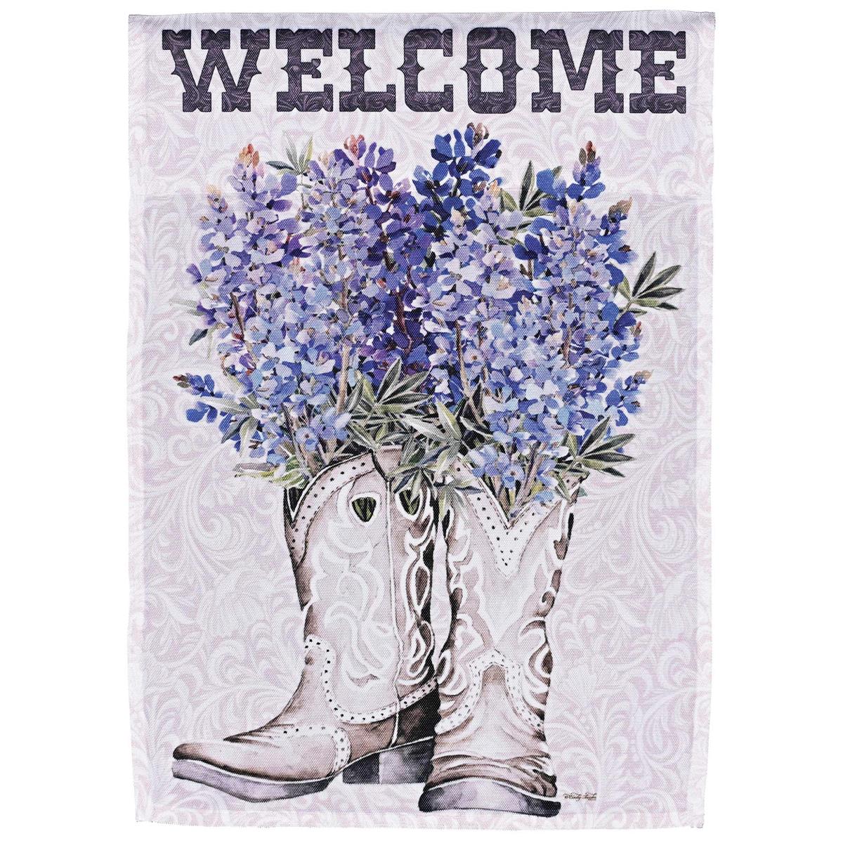 Welcome Bluebonnet garden flag featuring bluebonnet flowers, displayed outdoors, showcasing vibrant colors that create a stained glass effect.