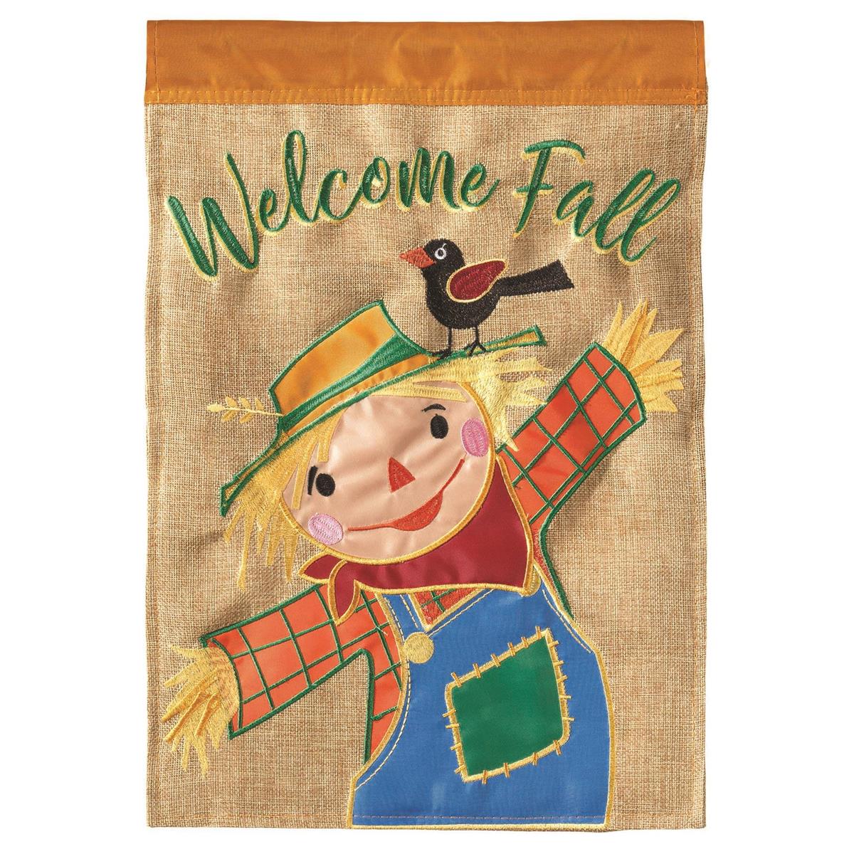 Welcome Fall Scarecrow Burlap Garden Flag measuring 13x18 inches, featuring a colorful scarecrow design displayed outdoors in a garden setting.