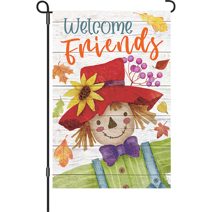 12 in. Welcome Friends garden flag made of PremierSoftTM fabric, displayed outdoors with vibrant colors and inviting message.