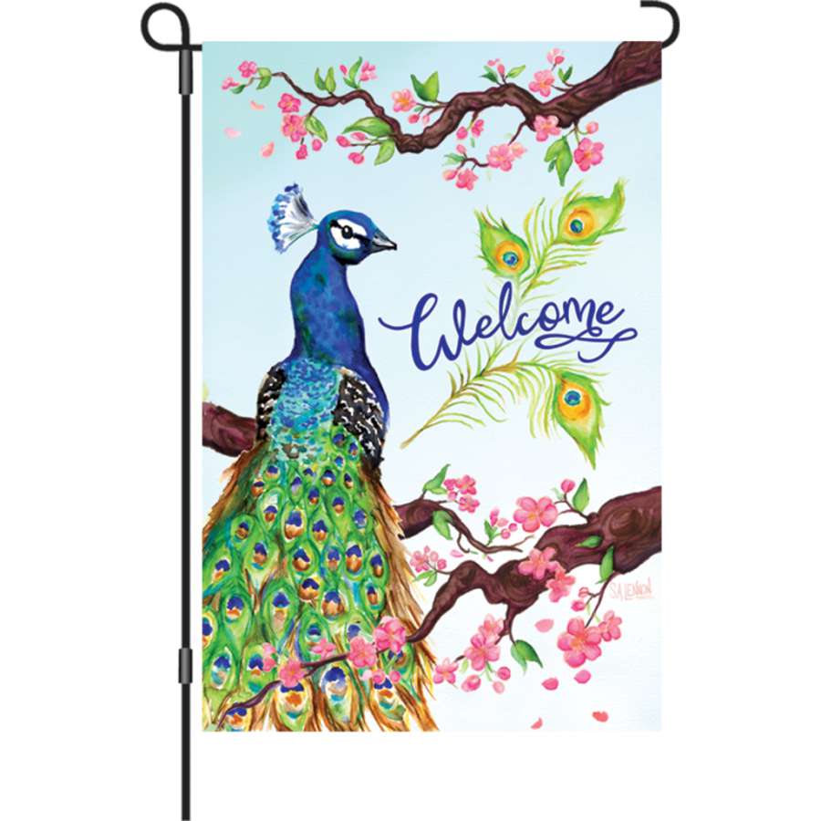12 in. Welcome Peacock flag featuring a colorful peacock design and welcoming text, displayed elegantly in an outdoor setting.