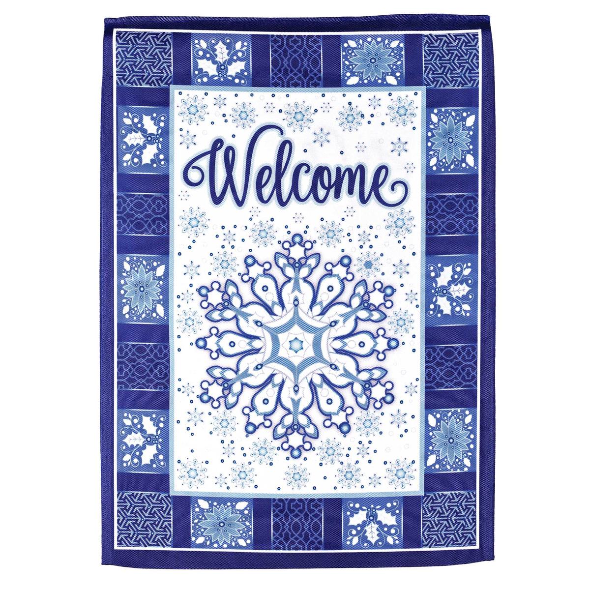 Welcome Snowflake garden flag with intricate snowflake design displayed outdoors, creating a warm and inviting atmosphere in a winter setting.