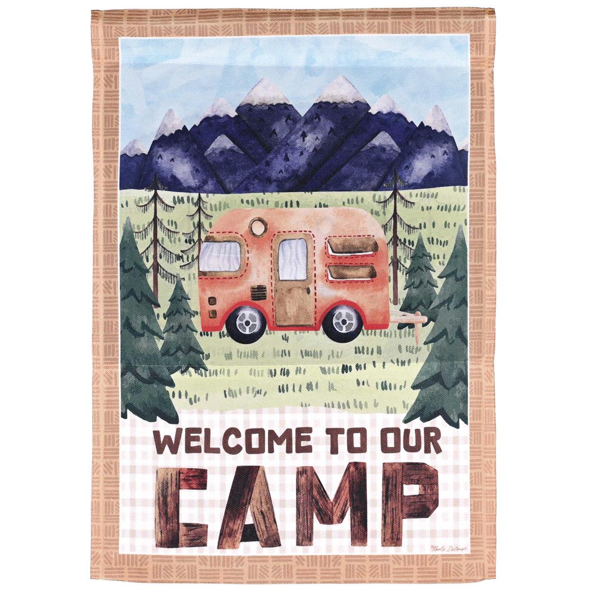 Welcome to Our Camp garden flag, 13x18 inches, displaying vibrant outdoor-themed design with stained glass effect in a garden setting.