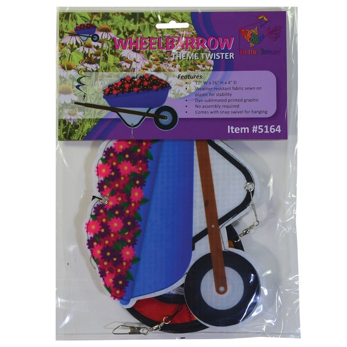 Wheelbarrow Theme Twister with colorful spinning wheelbarrow design and curlie tail, displayed in a garden setting with flowers.
