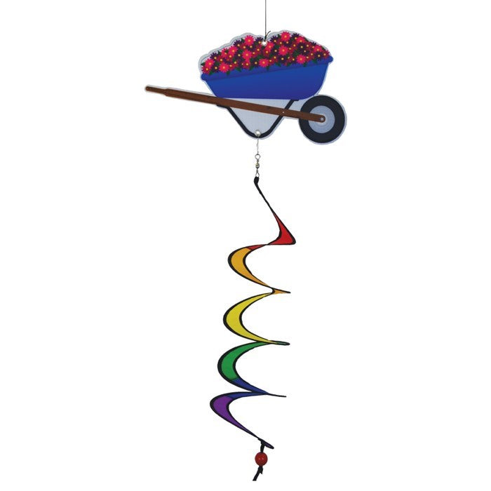 Wheelbarrow Theme Twister with colorful spinning wheelbarrow design and curlie tail, displayed in a garden setting with flowers.
