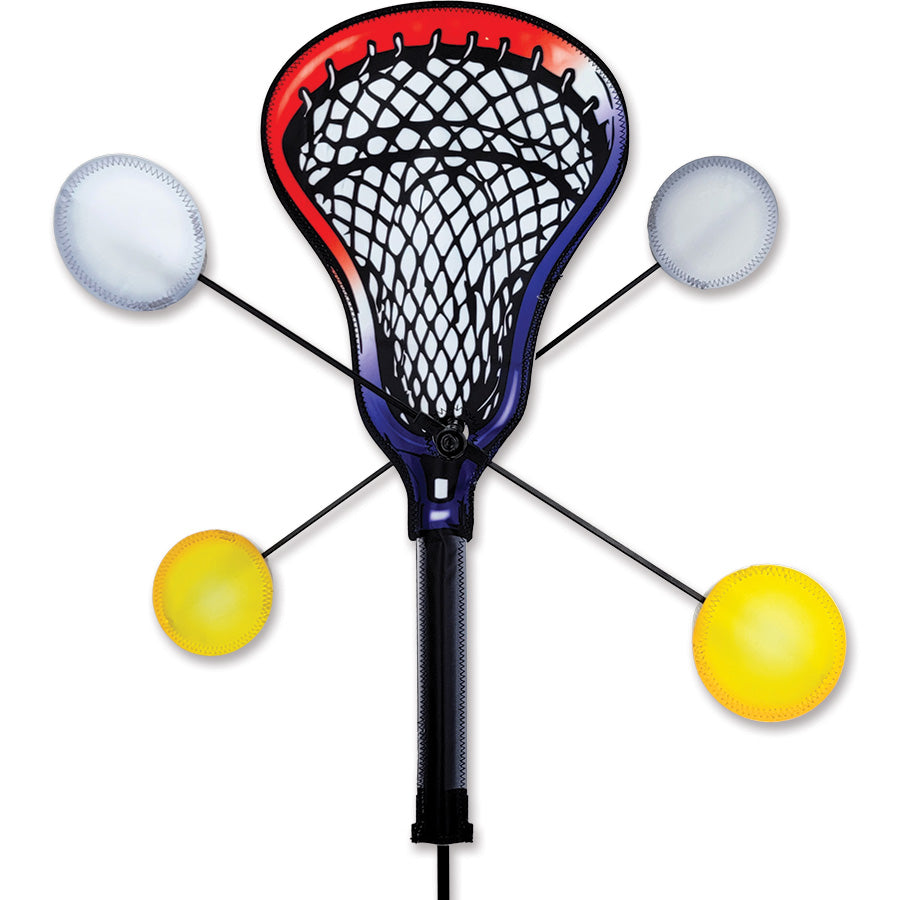 WhirliGig Spinner - Lacrosse featuring colorful yellow and white lacrosse balls, spinning in the gentle breeze in a garden setting.