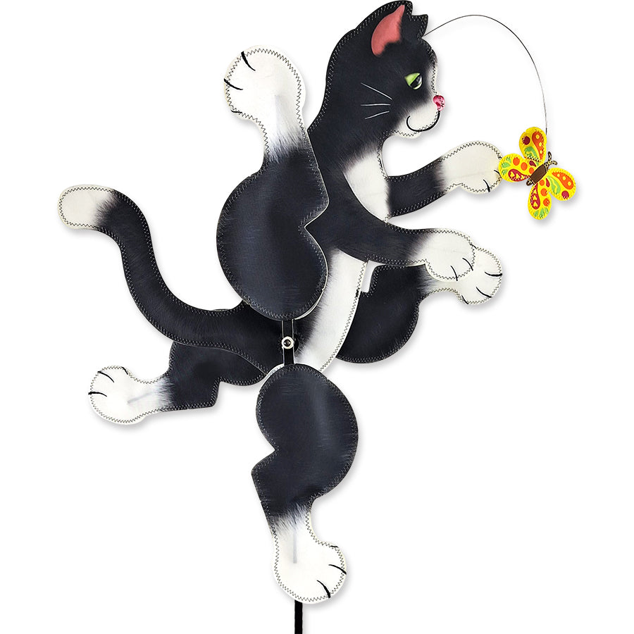 22 in. WhirliGig Spinner featuring a colorful running cat design spinning in the breeze, showcasing its vibrant SunTex fabric in an outdoor garden setting.