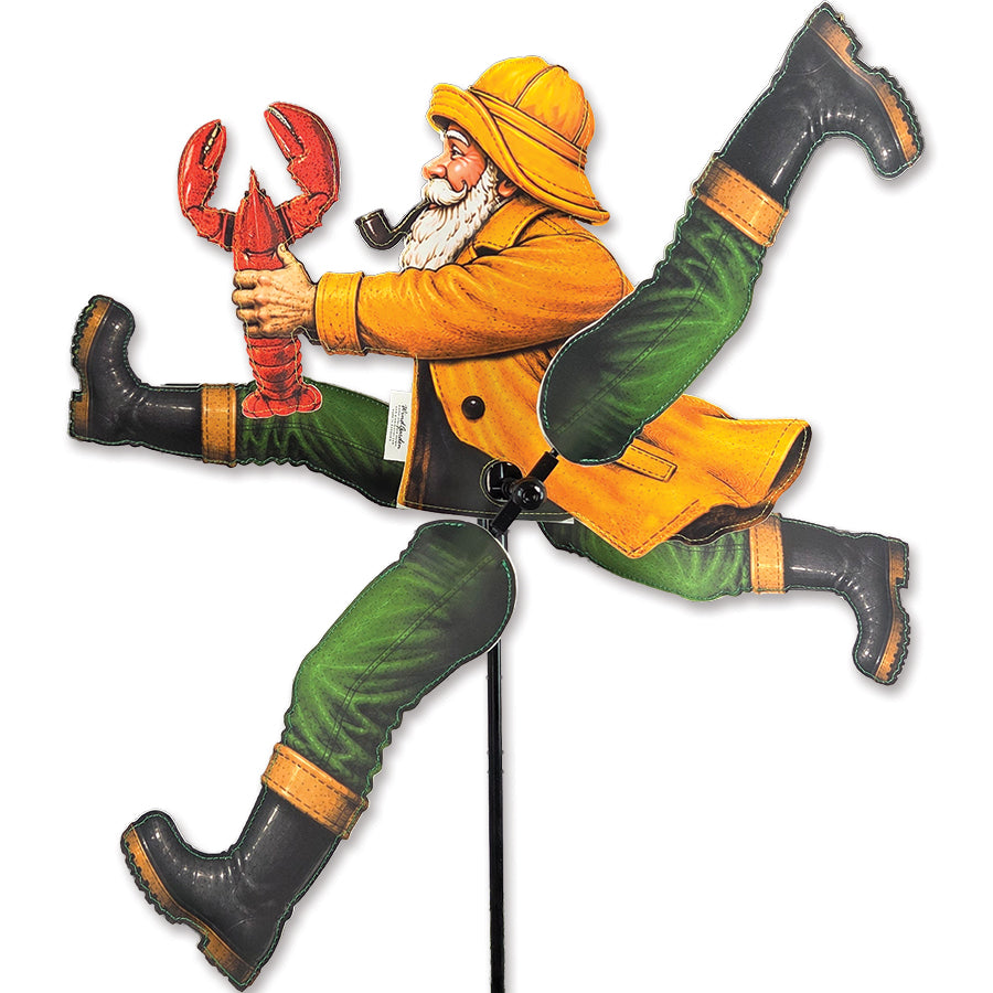 WhirliGig Spinner featuring a Running Fisherman holding a lobster in a colorful design, spinning gently in a garden setting.