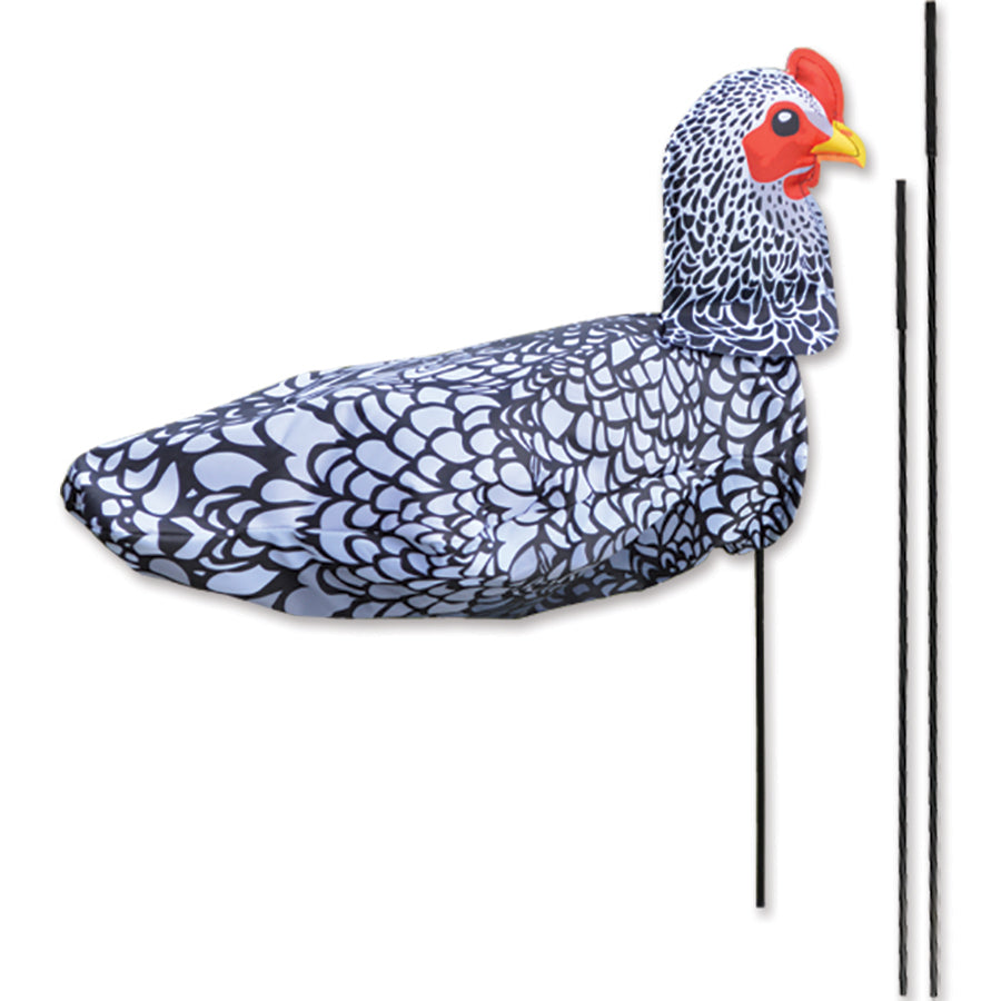Windicator Recumbent Bike Flag featuring a colorful chicken design, inflated and mounted on a recumbent bicycle in an outdoor setting.
