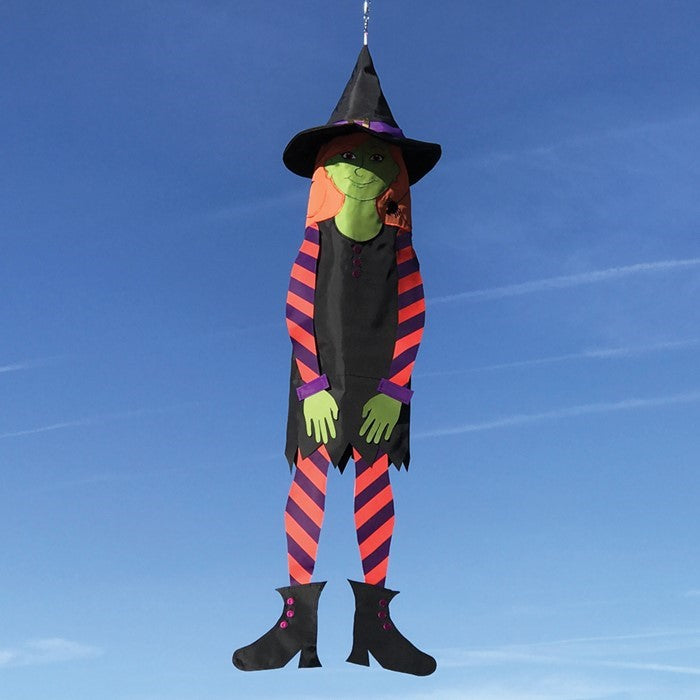 Witch 40-inch Breeze Buddy windsock with flowing arms and legs displayed outdoors, capturing the spirit of Halloween excitement.