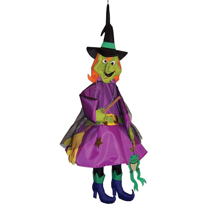 Witch Wind Friend 3D windsock design featuring a witch and frog, hanging outdoors in a colorful garden setting, perfect for Halloween.