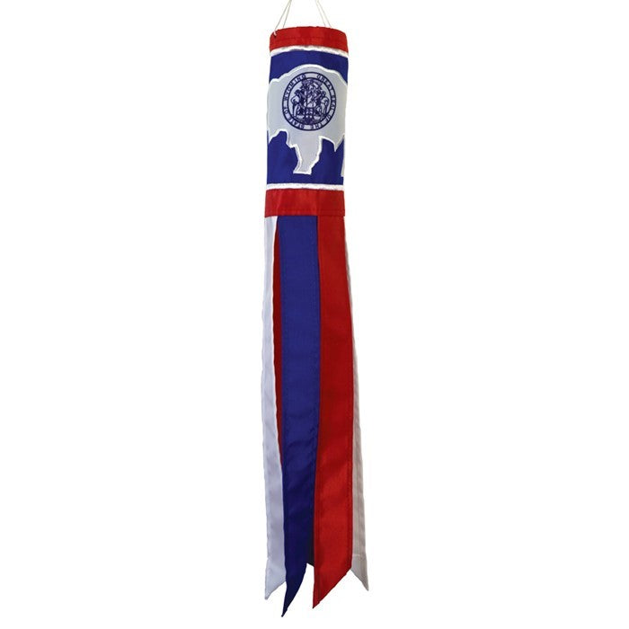 Wyoming 18 inch windsock featuring colorful patterns and six fluttering tails, displayed outdoors in a breezy environment.