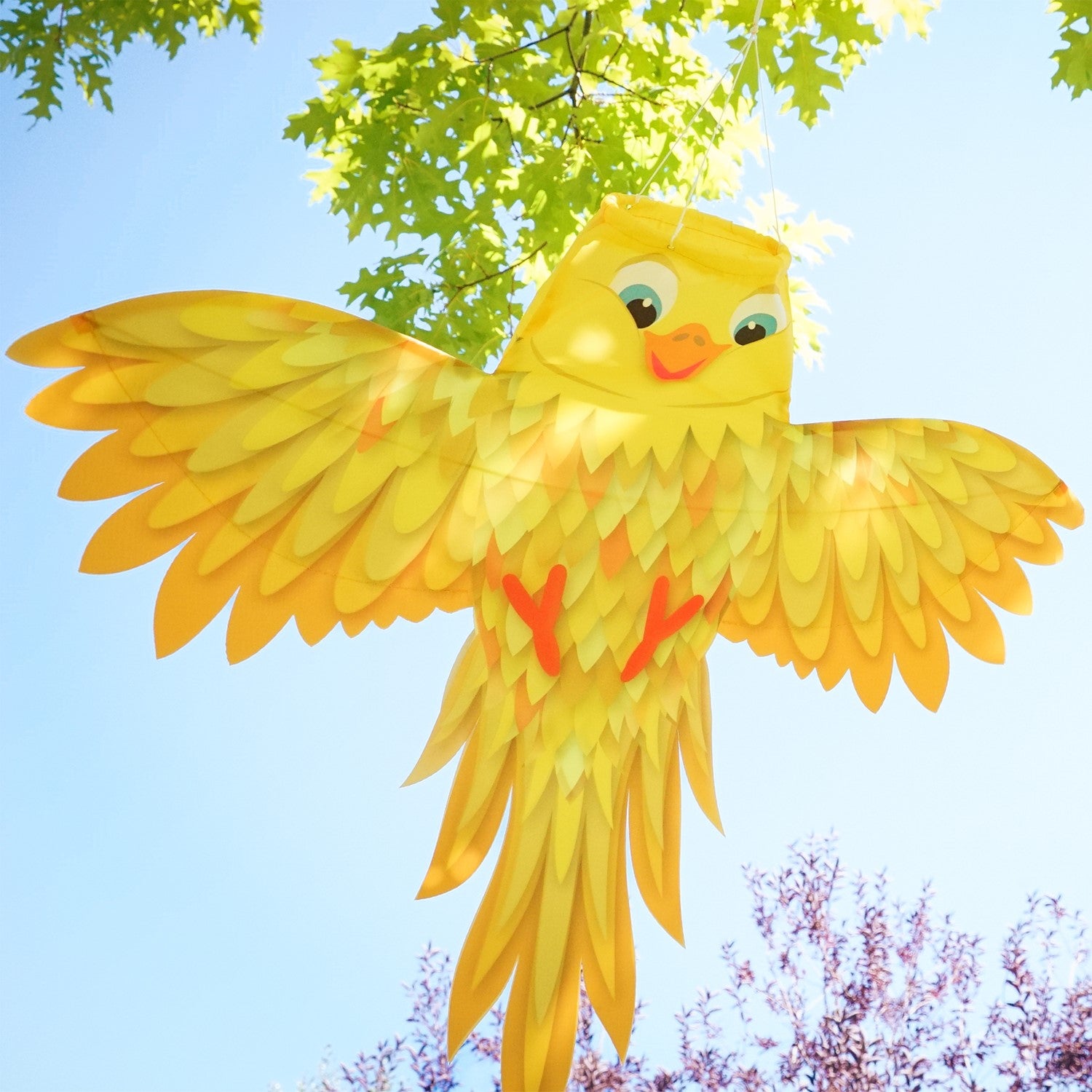 Yellow Bird Windsock in vibrant yellow with outstretched wings, designed for outdoor hanging, swaying beautifully in the breeze.