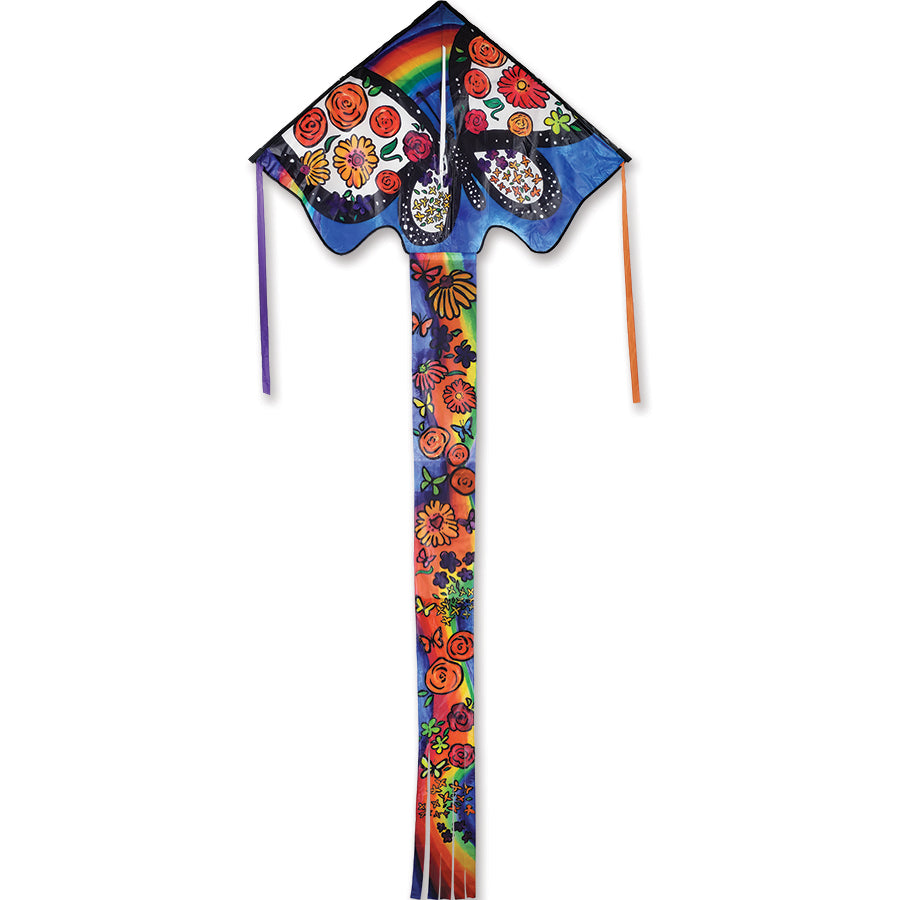 Zephyr Kite - Floral Butterfly flying high against a clear blue sky, showcasing vibrant floral graphics, ideal for outdoor fun.
