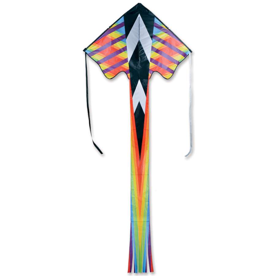 Zephyr Kite - Rainbow Geometric design, 64x165 inches, soaring in a clear blue sky with a picturesque landscape below.