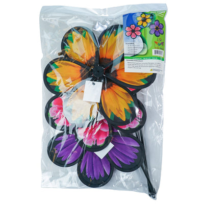 Assorted 10-inch realistic flower spinners showcasing Aster, Sunflower, and Peony designs, gently spinning in an outdoor garden setting.