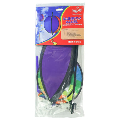 Colorful 11-inch Rainbow-Panel Hanging Ball Spinner displaying six vibrant panels and a curly tail, spinning in the garden under outdoor sunlight.