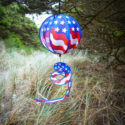 This 11" USA Flag Hanging Ball Spinner features six vibrant flag panels that spin in the wind, creating a beautiful display for any patriotic occasion.