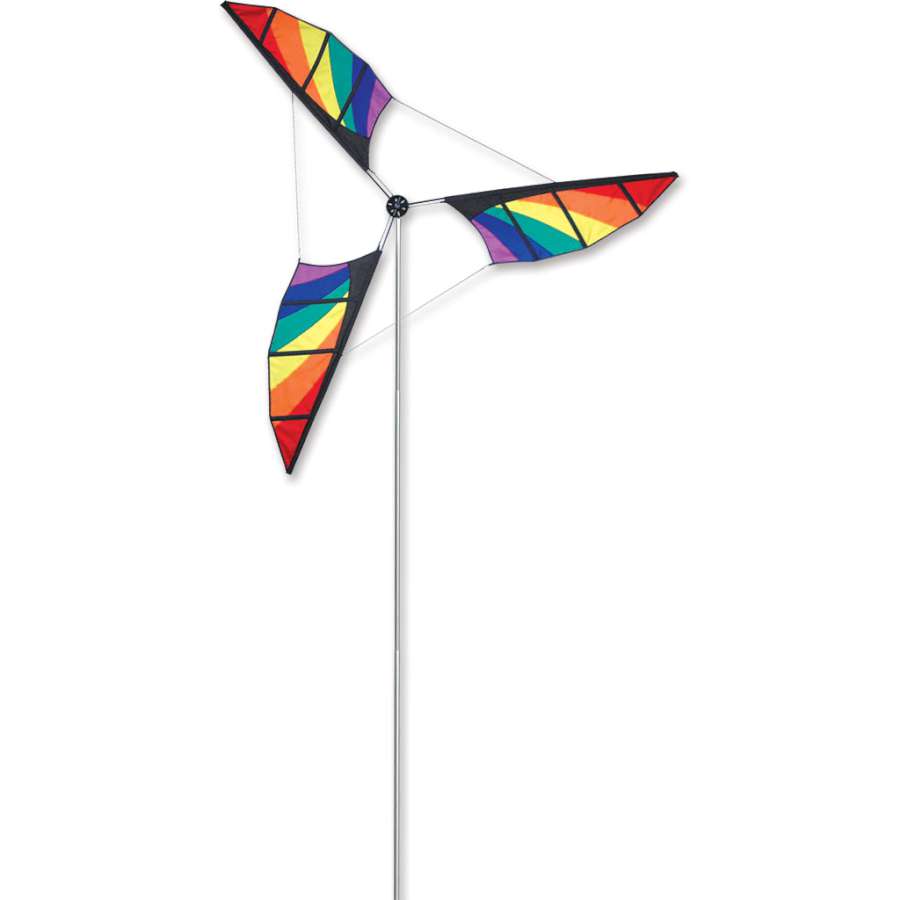 12.5 ft. Rainbow Wind Generator with an aluminum mast in a garden setting, showcasing colorful rotating blades against the sky.