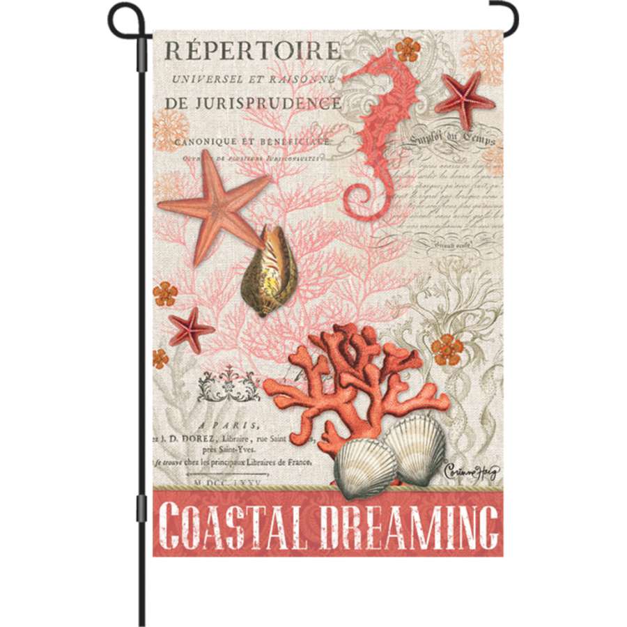 12 in. Coastal Dreaming garden flag made from PremierSoft fabric featuring a serene beach scene, displayed in an outdoor garden setting.