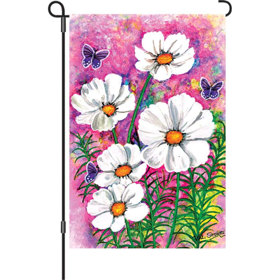 12 in. Cosmos Cluster garden flag displaying vibrant cosmic imagery, illuminated for captivating outdoor aesthetics in a garden setting.