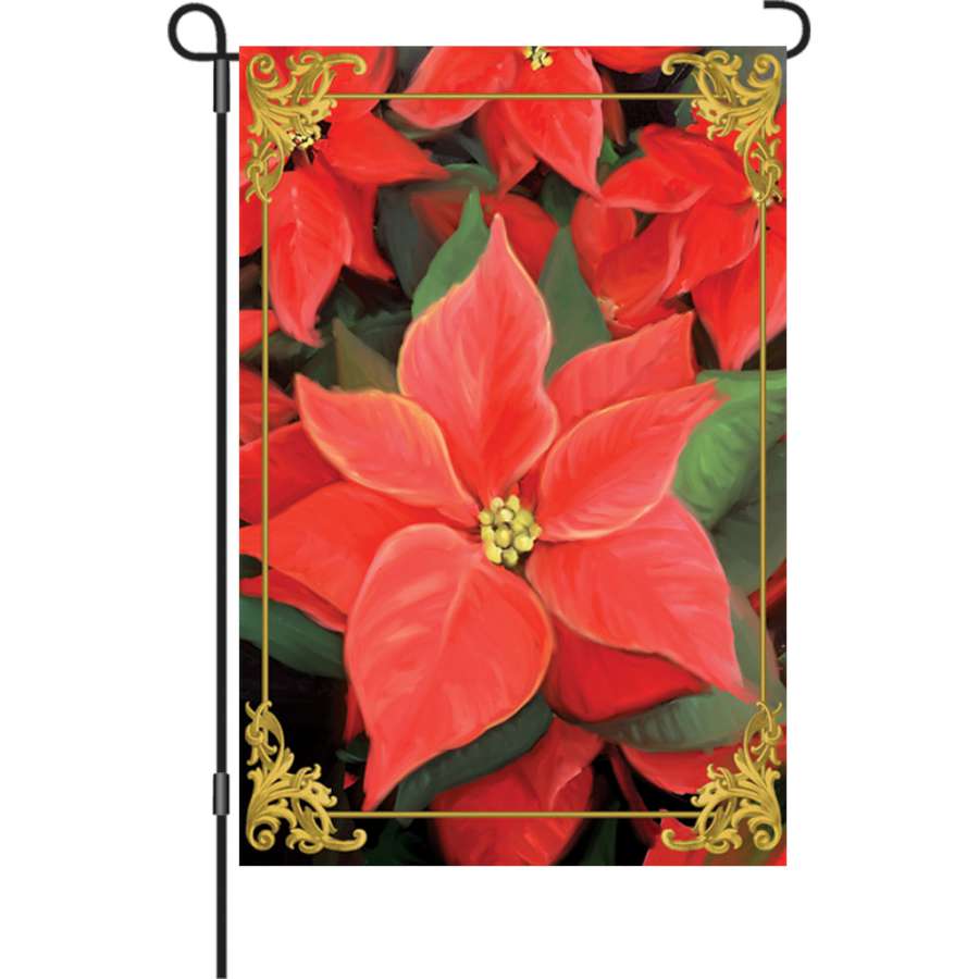 12 in. Elegant Poinsettia garden flag featuring a vibrant print of Christmas poinsettias, displayed outdoors in a garden setting.