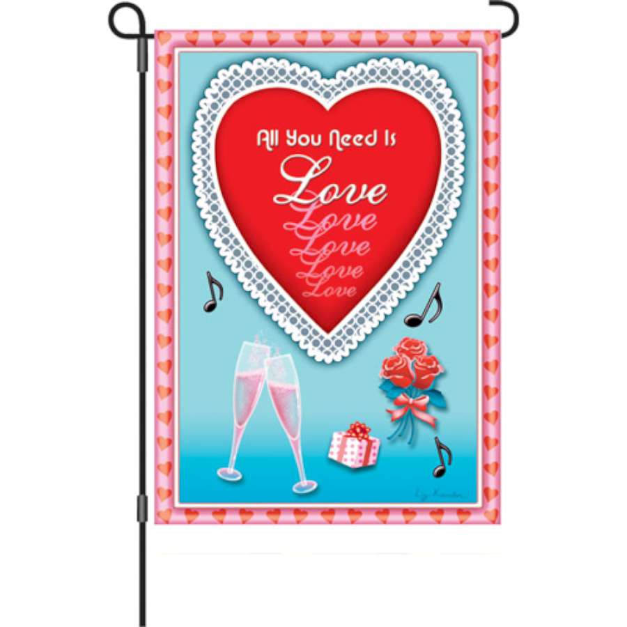 12 in. garden flag featuring 'All You Need Is Love' in colorful letters displayed in an outdoor setting.