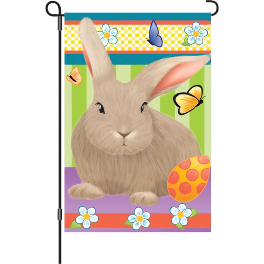 12 in. Hip Hop Bunny garden flag featuring a colorful bunny design displayed on a garden stand.