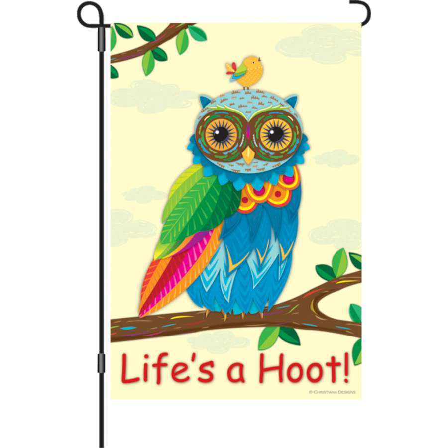 12 in. Flag - Life's a Hoot! featuring colorful text and graphics on a soft fabric, swaying gently in the garden breeze, perfect for outdoor decor.