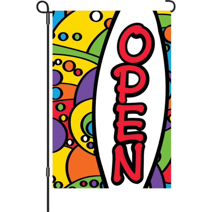 12 in. Rainbow Orbit Open garden flag made of PremierSoft fabric, displaying colorful design with the word 'OPEN' in a sunny garden.