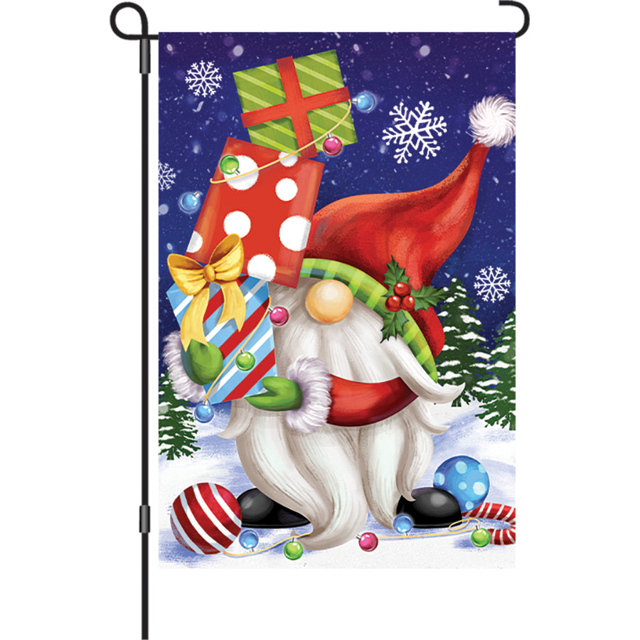 12 in. Illuminated Garden Flag with colorful gnome design displayed in a garden, showcasing bright LED lights for nighttime visibility.