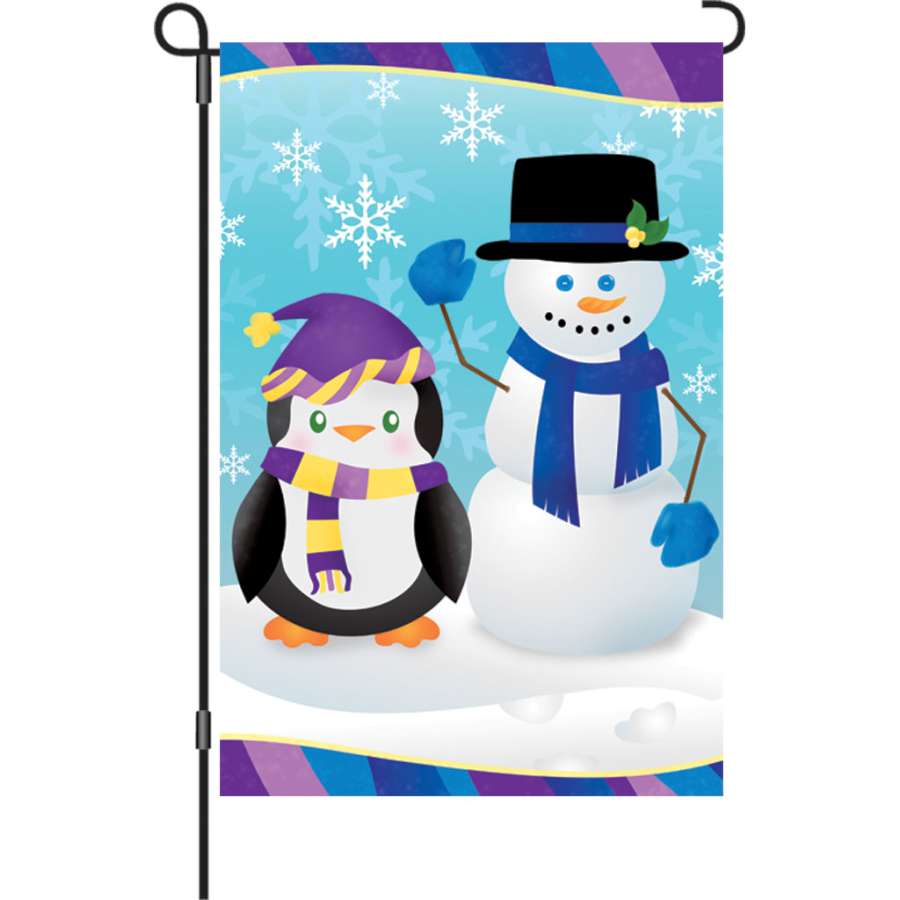 12 in. Penguin's Pal garden flag featuring a cute penguin design, displayed outdoors in a yard setting during winter.