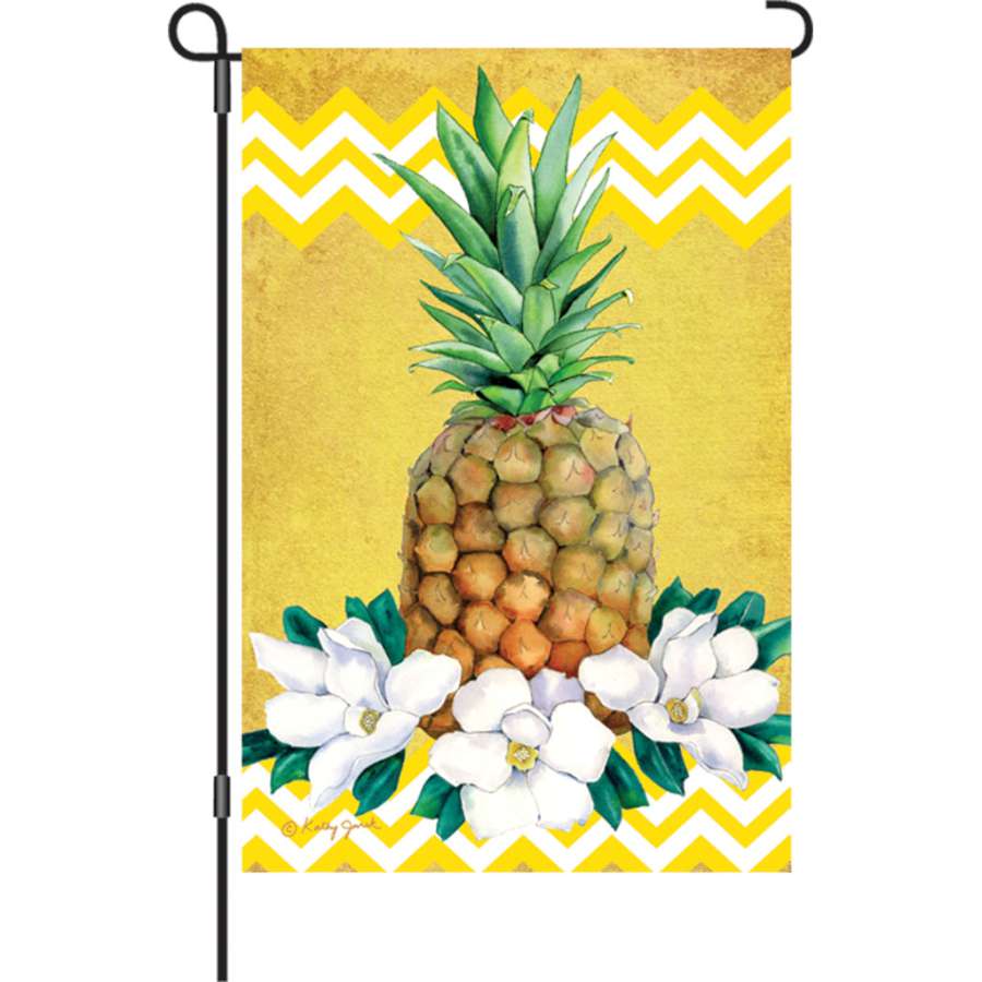 12 in. Pineapple Flag with vibrant colors and illuminated design, displayed in a garden setting to enhance summer ambiance.
